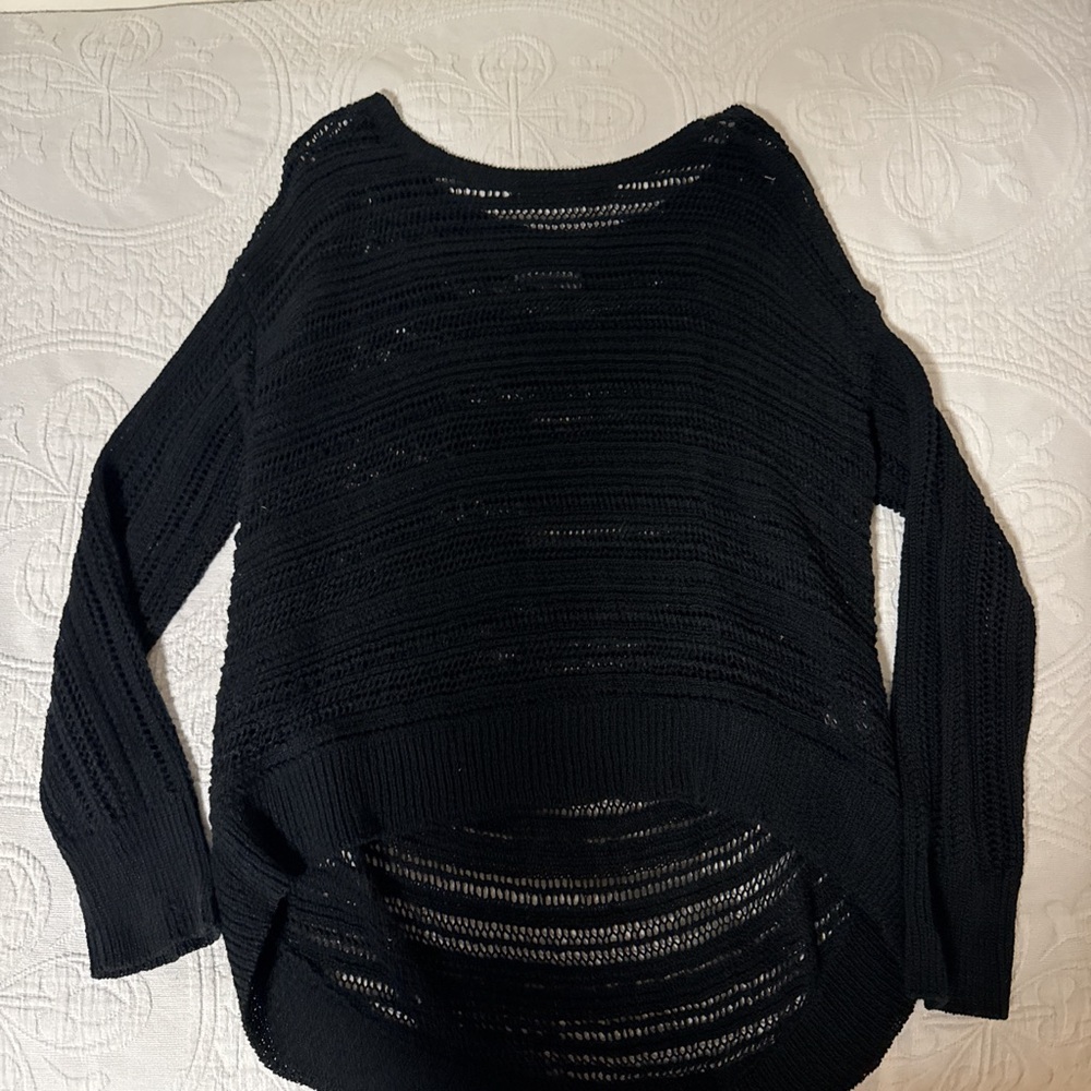 Black knit sweater with a relaxed fit